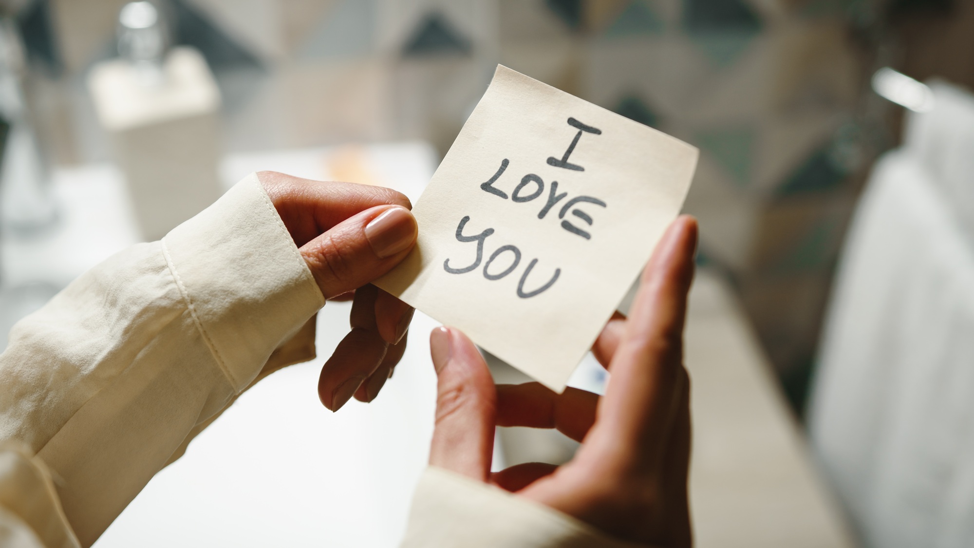 I love you sign on post-it note